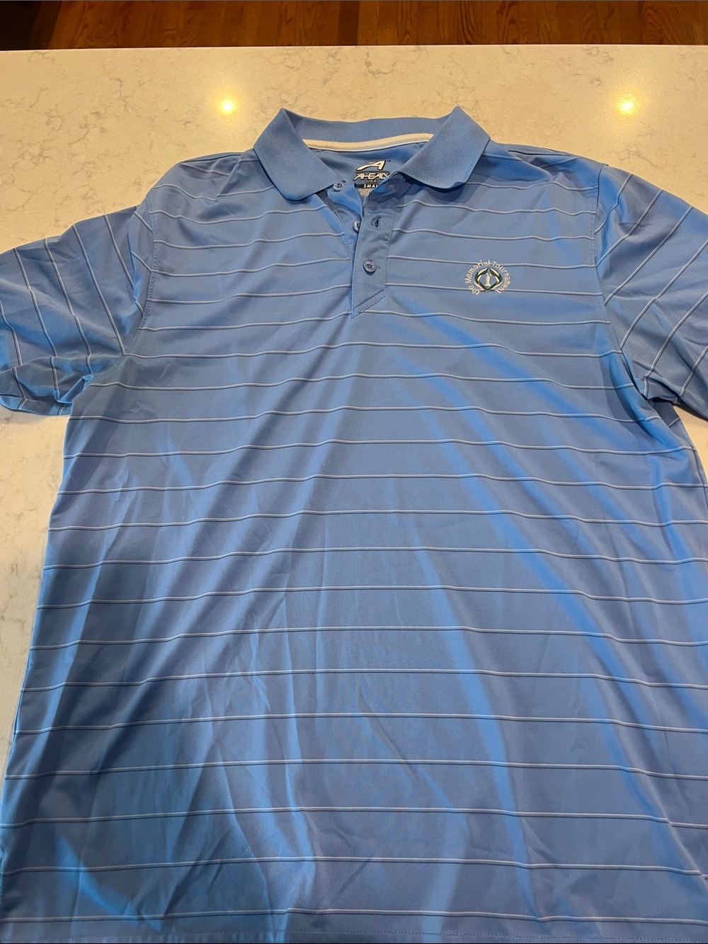 Men's Light Blue Striped Polo Memorial Tournament